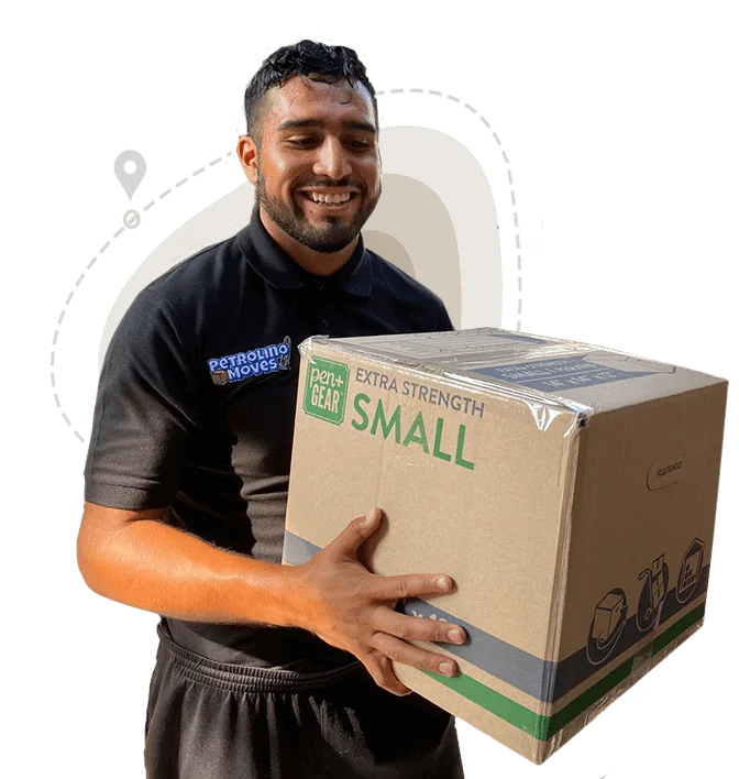 A Petrolino Moves mover in a branded shirt carrying a moving box