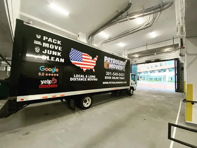 A Petrolino Moves box truck advertising local and long distance moving